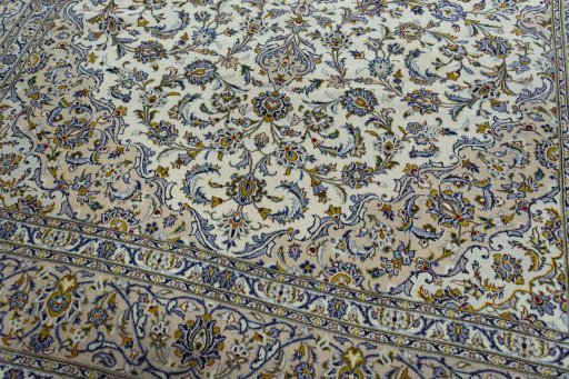 Close-up detail of 2000s Kashan rug from Iran / Persia showing Wool weave