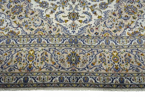 Full view of 2000s Kashan rug from Iran / Persia, 405 × 293 cm in Beige tones