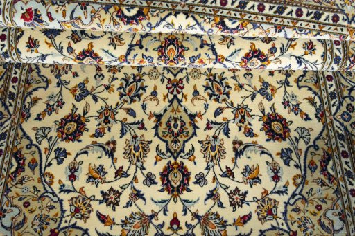 Close-up detail of 2000s Kashan rug from Iran / Persia showing Cork weave