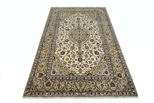 Surface texture of 2000s Kashan rug with natural Cork and intricate pattern