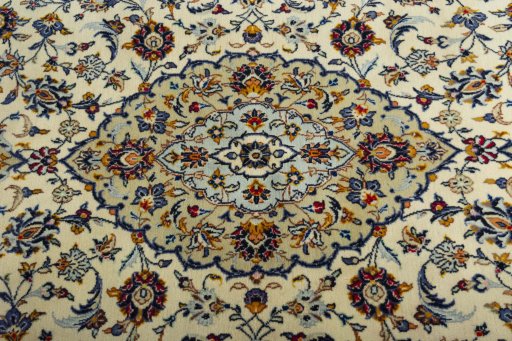 Central medallion detail of 2000s Kashan rug from Iran / Persia