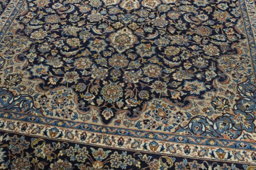 Close-up detail of 2000s Kashan rug from Iran / Persia showing Wool weave