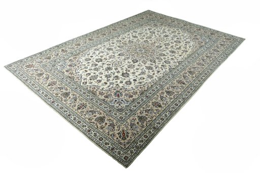 Corner detail of 2000s Kashan rug showing border pattern and Wool pile