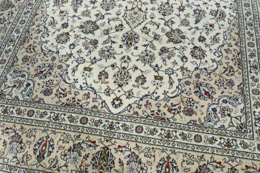 Close-up detail of 2000s Kashan rug from Iran / Persia showing Wool weave