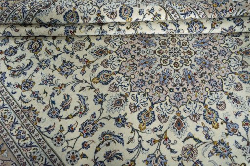 Close-up detail of 2000s Kashan rug from Iran / Persia showing Wool weave