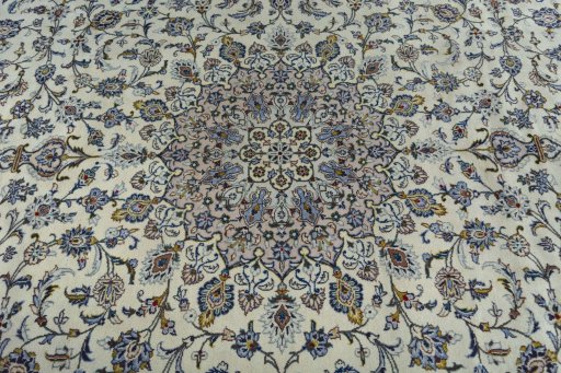 Central medallion detail of 2000s Kashan rug from Iran / Persia
