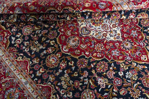 Close-up detail of New Kashan rug from Iran / Persia showing Cork weave