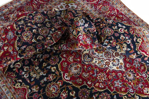 Surface texture of New Kashan rug with natural Cork and intricate pattern