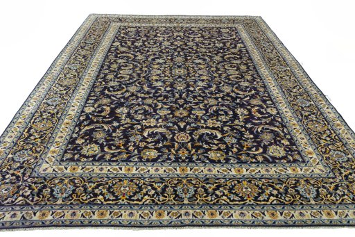 Surface texture of 2000s Kashan rug with natural Wool and intricate pattern