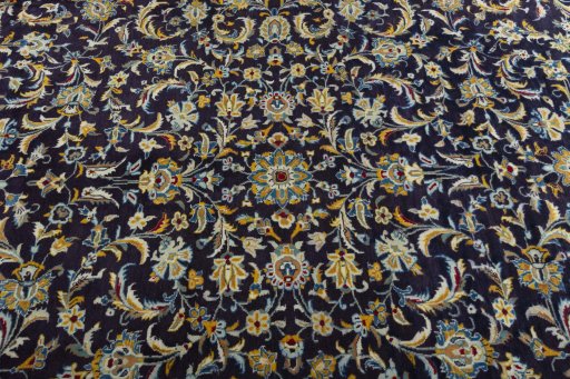 Central medallion detail of 2000s Kashan rug from Iran / Persia