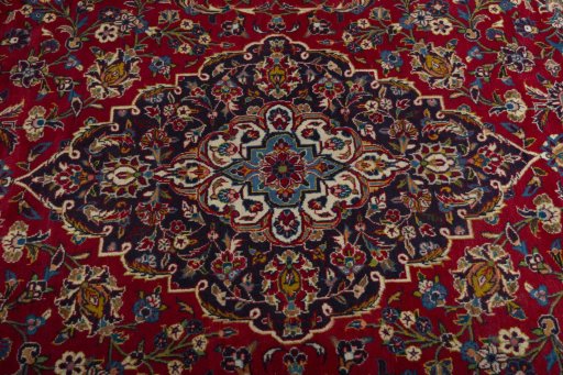 Central medallion detail of 2000s Kashan rug from Iran / Persia