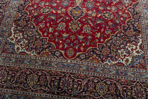 Close-up detail of 2000s Kashan rug from Iran / Persia showing Wool weave