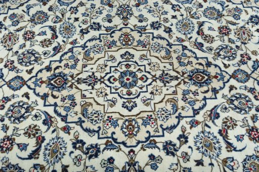 Central medallion detail of 2000s Kashan rug from Iran / Persia