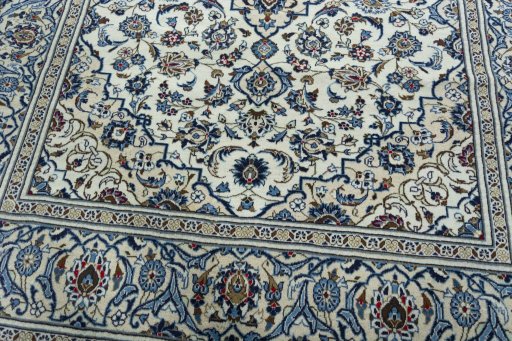 Close-up detail of 2000s Kashan rug from Iran / Persia showing Wool weave