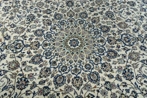 Central medallion detail of 2000s Kashan rug from Iran / Persia