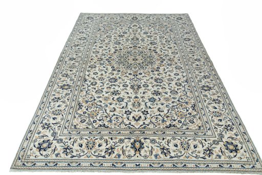 Surface texture of 2000s Kashan rug with natural Wool and intricate pattern