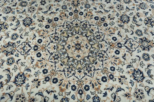 Central medallion detail of 2000s Kashan rug from Iran / Persia
