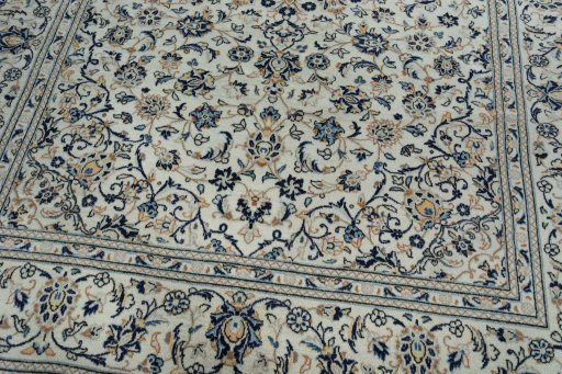 Close-up detail of 2000s Kashan rug from Iran / Persia showing Wool weave