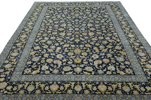 Surface texture of 2000s Kashan rug with natural Wool and intricate pattern