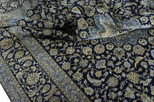 Surface texture of 2000s Kashan rug with natural Cork and intricate pattern
