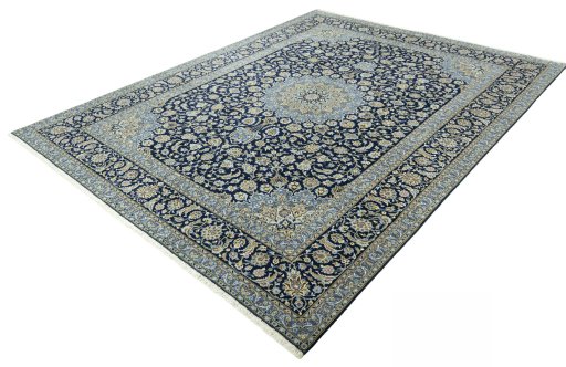 Corner detail of 2000s Kashan rug showing border pattern and Cork pile