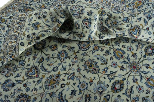 Surface texture of 2000s Kashan rug with natural Wool and intricate pattern