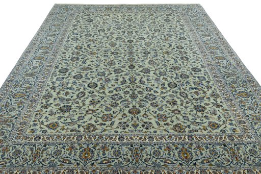 Surface texture of 2000s Kashan rug with natural Wool and intricate pattern