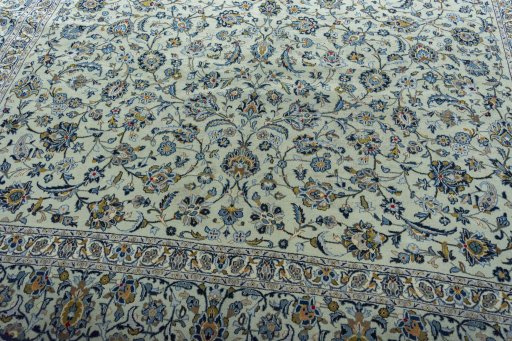 Close-up detail of 2000s Kashan rug from Iran / Persia showing Wool weave
