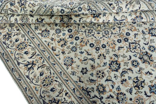 Close-up detail of 2000s Kashan rug from Iran / Persia showing Wool weave