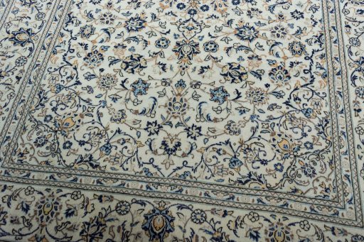 Close-up detail of 2000s Kashan rug from Iran / Persia showing Wool weave
