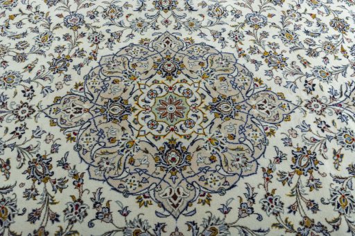 Central medallion detail of 2000s Kashan rug from Iran / Persia
