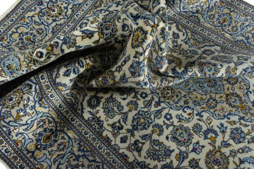 Surface texture of 2000s Kashan rug with natural Wool and intricate pattern