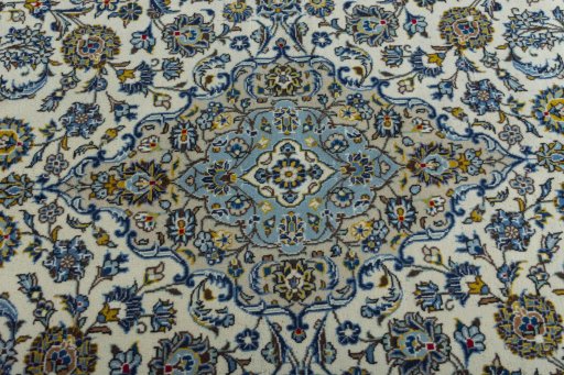 Central medallion detail of 2000s Kashan rug from Iran / Persia