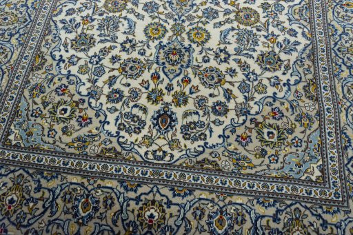 Close-up detail of 2000s Kashan rug from Iran / Persia showing Wool weave
