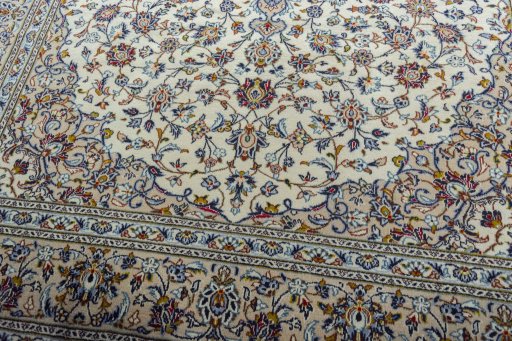 Close-up detail of 2000s Kashan rug from Iran / Persia showing Wool weave