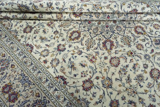 Close-up detail of 2000s Kashan rug from Iran / Persia showing Wool weave