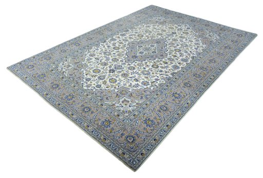 Corner detail of 2000s Kashan rug showing border pattern and Wool pile