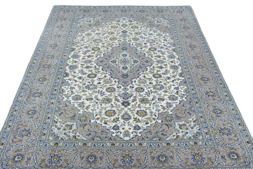 Surface texture of 2000s Kashan rug with natural Wool and intricate pattern