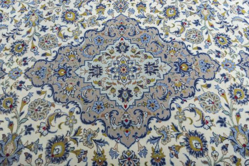 Central medallion detail of 2000s Kashan rug from Iran / Persia