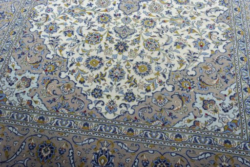 Close-up detail of 2000s Kashan rug from Iran / Persia showing Wool weave
