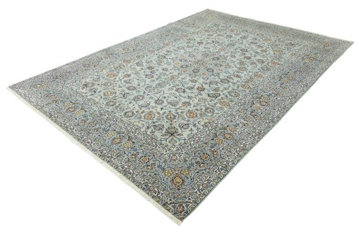 Corner detail of 2000s Kashan rug showing border pattern and Wool pile