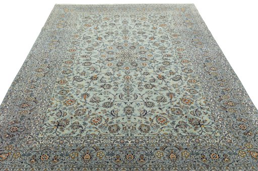 Surface texture of 2000s Kashan rug with natural Wool and intricate pattern