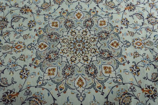 Central medallion detail of 2000s Kashan rug from Iran / Persia