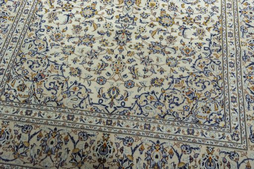 Close-up detail of 2000s Kashan rug from Iran / Persia showing Wool weave