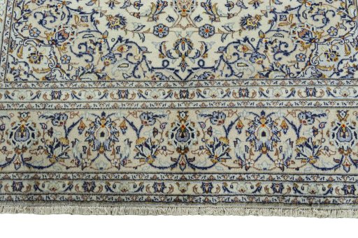 Full view of 2000s Kashan rug from Iran / Persia, 297 × 203 cm in Beige tones