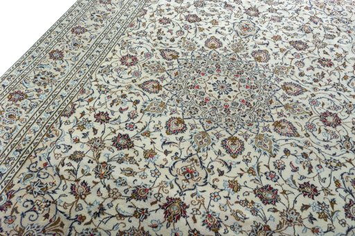 Backside of handmade 2000s Kashan rug showing knot structure and weave density