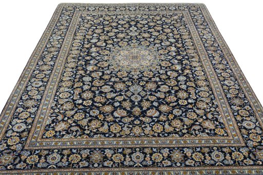 Surface texture of 2000s Kashan rug with natural Wool and intricate pattern