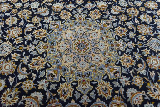 Central medallion detail of 2000s Kashan rug from Iran / Persia