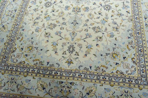 Close-up detail of 2000s Kashan rug from Iran / Persia showing Wool weave