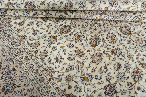 Close-up detail of 2000s Kashan rug from Iran / Persia showing Wool weave